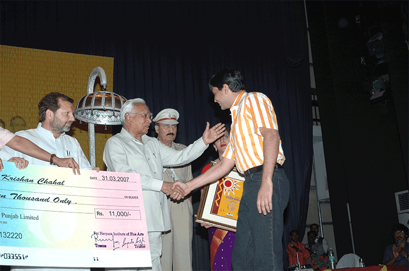 Krishan chahal taking award